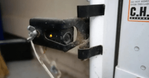 Garage door safety sensor with dust.