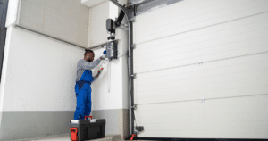 Technician repairing a garage door opener