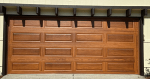 Wood-look garage door in bright sunlight.