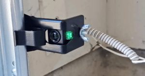 Garage door sensor with a green light